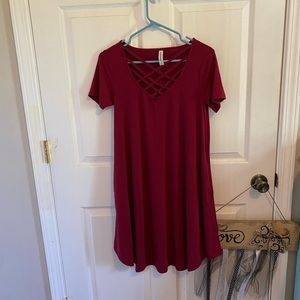 Maroon dress.